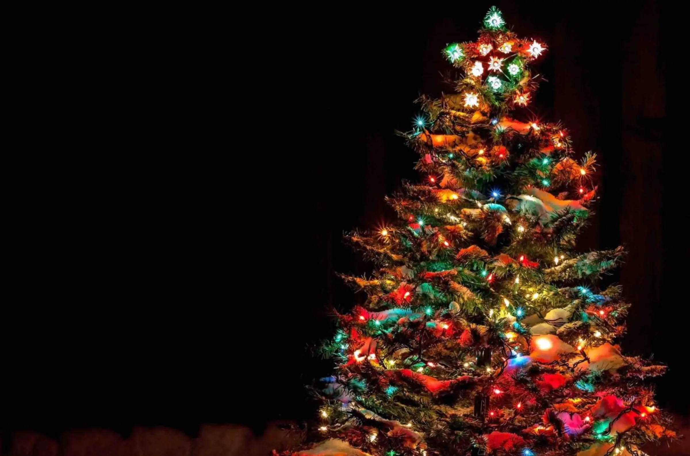 Christmas tree with bright colorful lights.